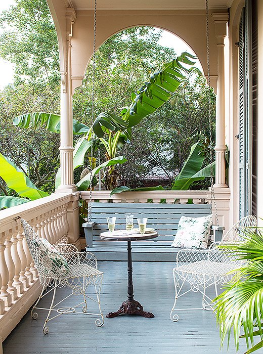 Like many houses in the area, Sara’s has multiple porches. As the sun moves and one porch gets hot, the family shifts to the shady one to enjoy lemonade or—depending on the time of day—a chilled glass of white on the swing or the vintage metal chairs.
