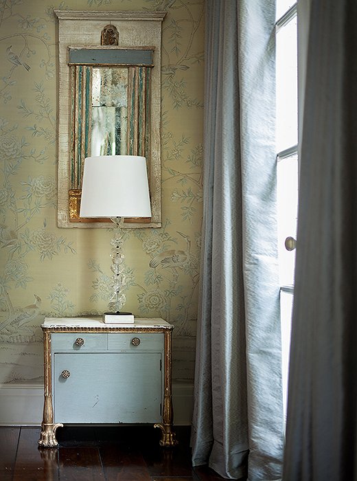 Suzanne chose this custom-colored de Gournay wallpaper for its soft sisal hue—”almost a no-color,” she says. Silk curtains in platinum blue tie in visually to the butler’s pantry.
 
