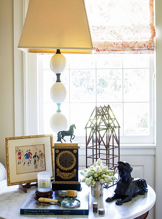 Timothy’s interest in history, art, and architecture are expressed in the objects on display, including an early-American model for a silo tower.
