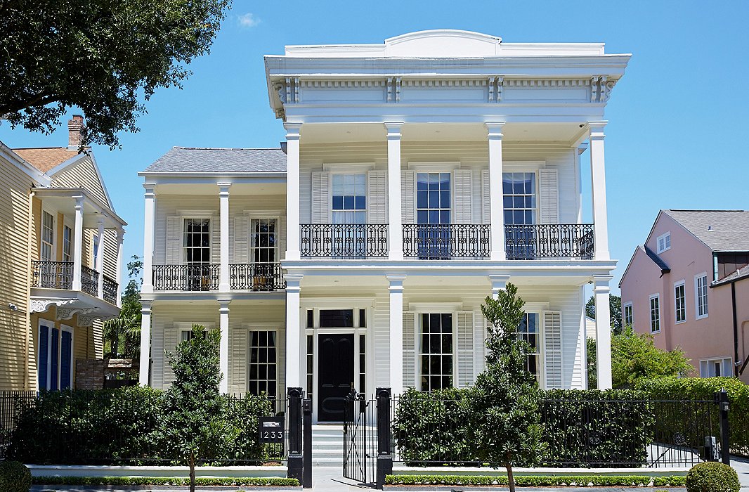 Stately columns, iron railings, and an all-white facade lend the 19th-century house a grand yet inviting stature. Jane Scott loves the community spirit of her Garden District neighborhood.
