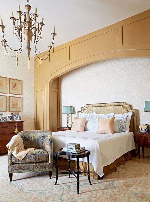 A graceful built-in nook adds architectural interest and gives the bed a grand presence.
