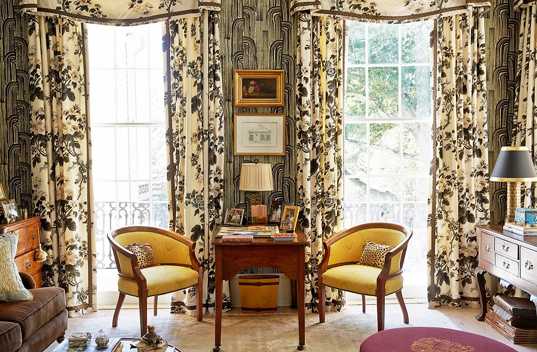 A desk that belonged to Philip as a child is now the go-to spot for letter-writing and homework. Black-and-white wallpaper by Kelly Wearstler makes the high ceilings feel even more expansive.
