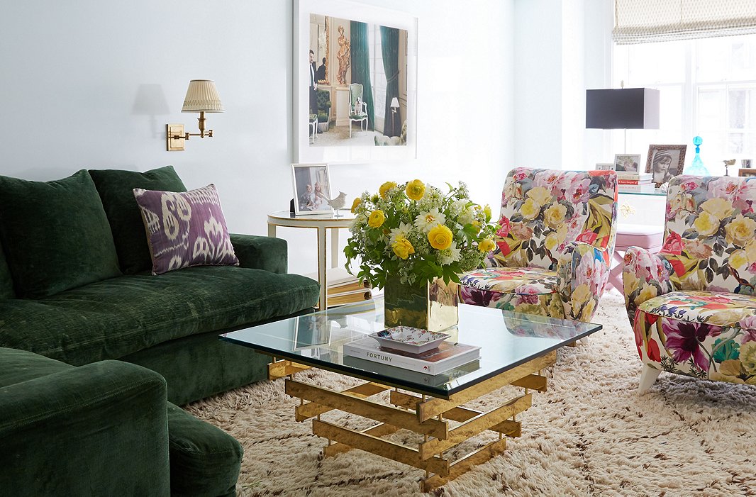 Lilly upholstered a pair of Vladimir Kagan chairs in a print she calls “a kind of contemporary chintz.” The Roman shades were created using a Fortuny print, which stays safely out of reach of little hands.
