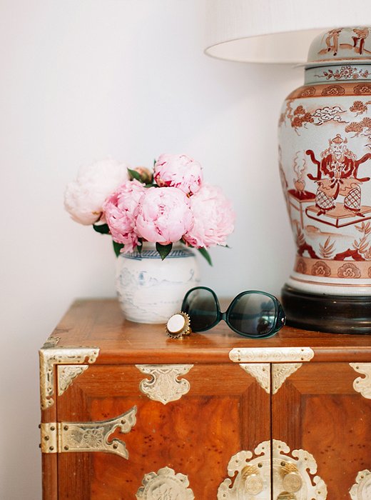 Gen embraces her love of collecting and pattern-on-pattern within her closet.
