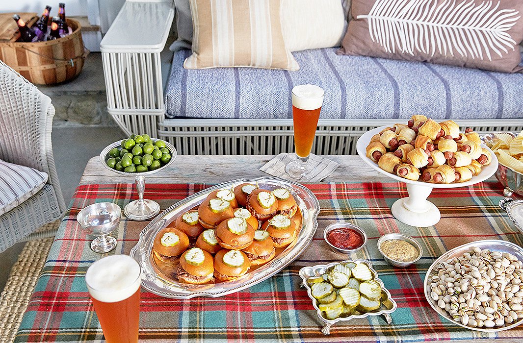 A tartan throw pulls double-duty as a table runner for the party.
