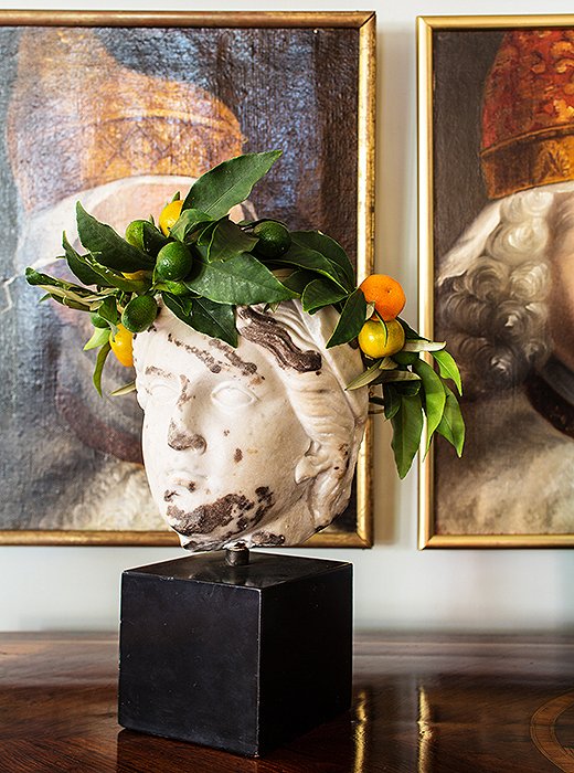 A bust is given a Christmas makeover with her beloved citrus and greenery.
