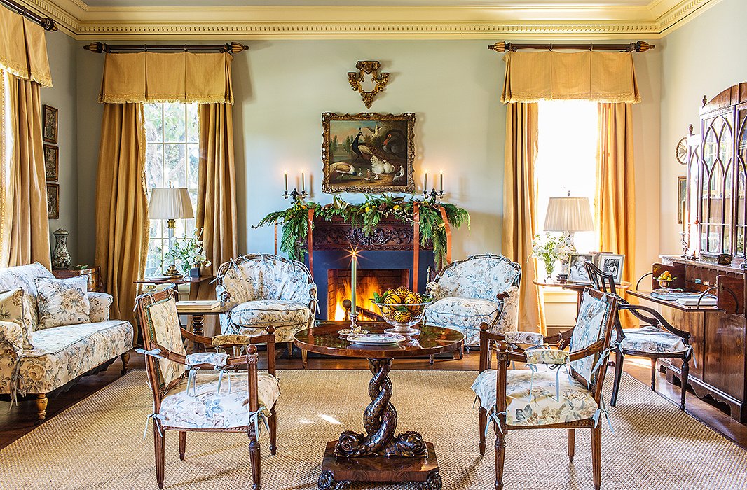 Making a grand style statement in one area—as Rheinstein does here with the lavishly dressed and candlelit mantel—is chicer and less distracting than doing a series of smaller vignettes throughout a room.
