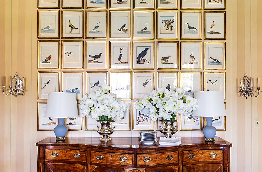 The bird prints, from a vintage ornithological book, were framed 18th-century style in a sculpted glass to create that beautiful, but not overly glossy, reflection.
