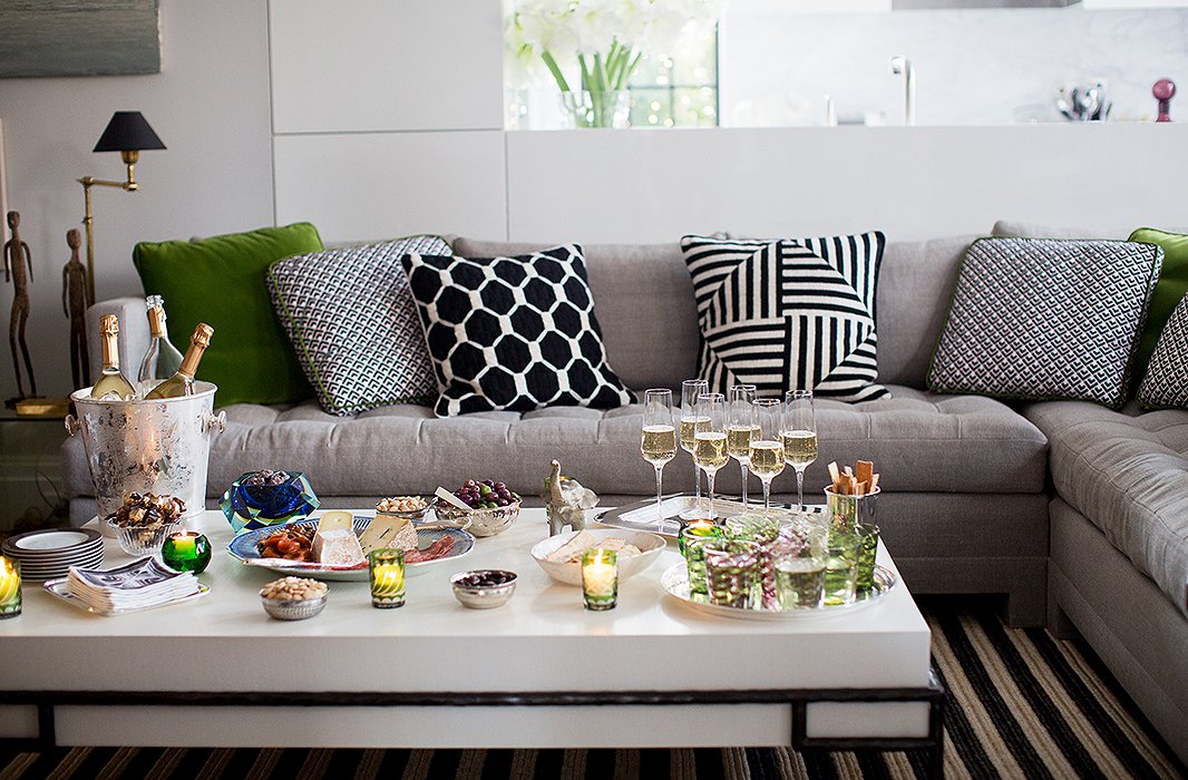 Given the apartment’s compact layout and lack of a formal dining space, entertaining is always intimate and takes place around the living room coffee table and sectional, which comfortably seats eight.
