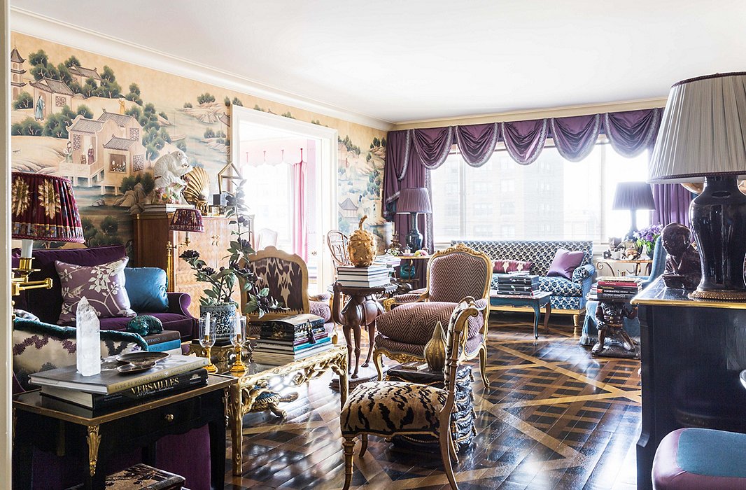 Sumptuous seating abounds in the apartment’s layered living room.
