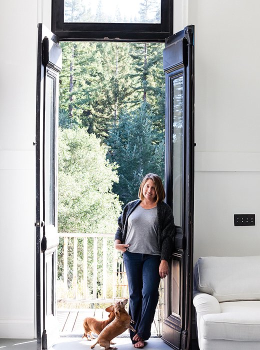 Dawn’s gorgeous double doors feature several glass windows that let light shine into her space.
