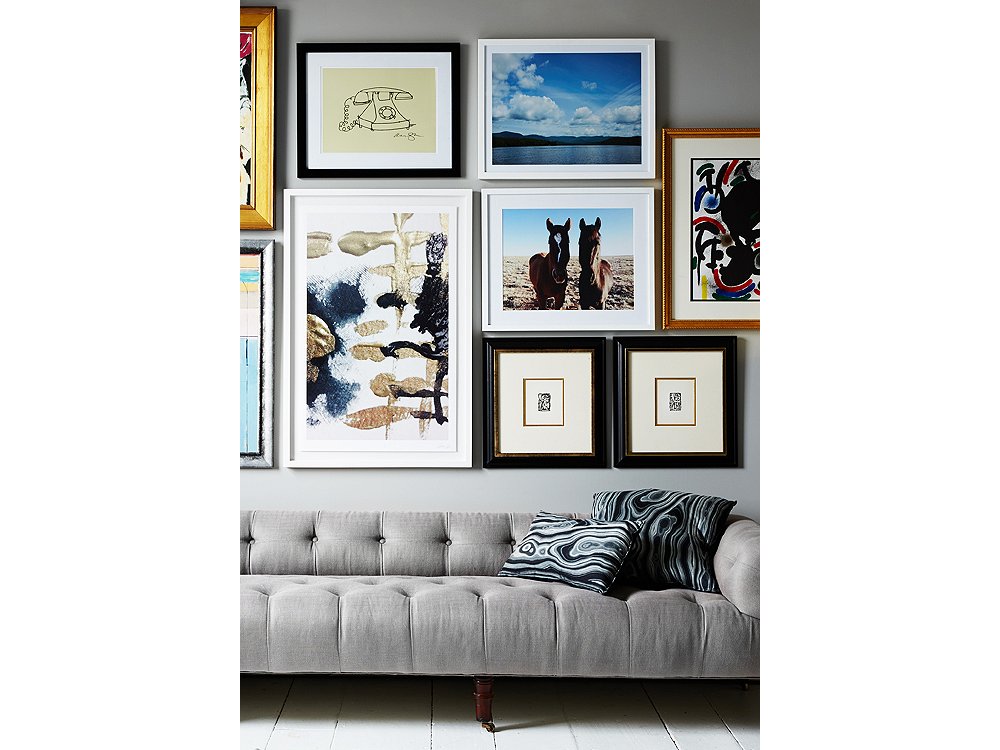 This gorgeous gray sofa provides the perfect anchor for epic wall art.
