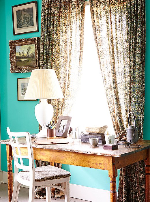 When guests aren’t present, the guest room is used as Philip’s dressing room and study; the curtains are made of Indian bedspreads found online.
