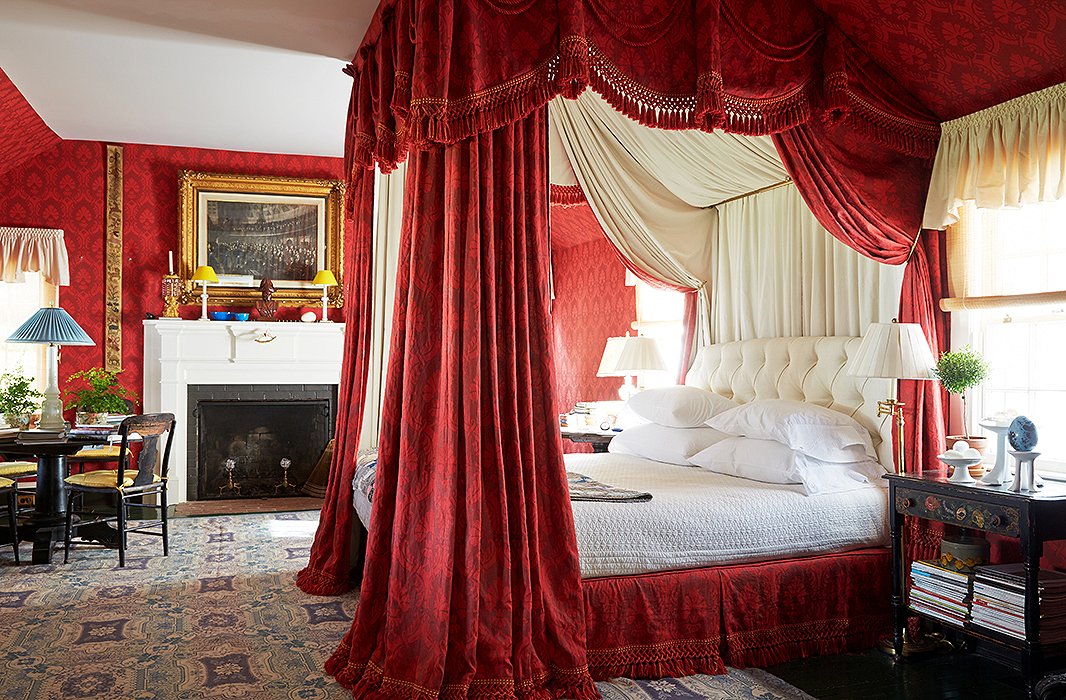 Dressed in Cote Bosque damask by Owens & Perry, Jeffrey’s bedroom is a riot of pattern on pattern. “Red fills it with atmosphere and dignity,” says Jeffrey. “It’s the opposite of poky. I wanted it to confirm my sense of place and pride—this is where the master is at home.”
