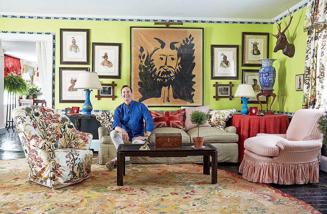 No matter where your eye lands in Jeffrey’s living room, it will be on something visually arresting, from the ink drawing surrounded by McKenney & Hall Native American portraits to the Brunschwig & Fils Les Lac floral upholstery.
