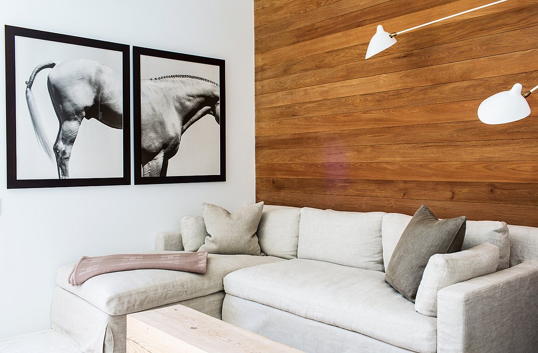 A plump pale-gray sectional is the perfect lounging spot for an evening in. “I’m an older mom,” says Kelly. “So by the time Lukas is in bed, I’m done.”
