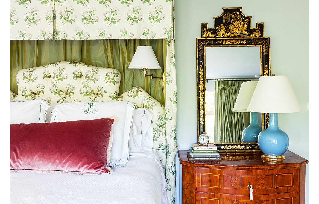 Megan designed the lovely pelmet treatment in bed drapery and headboard in Bowood by Colefax and Fowler. Another Christopher Spitzmiller lamp rests atop a vintage chinoiserie chest.

