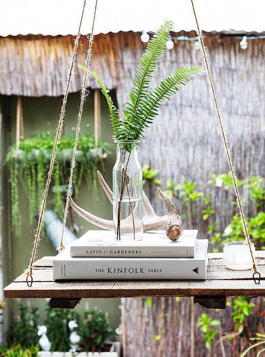 This hanging shelf is Morris’s favorite piece in her home. A smart use of space, and totally in line with her cool, natural vibe, it also stars in one of her most-liked Instagram shots.
