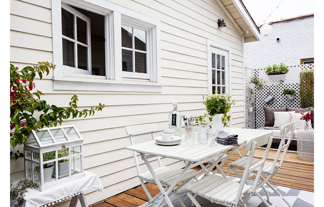 These simple and classic white bistro sets are lightweight enough to move around the garden and bring indoors.
