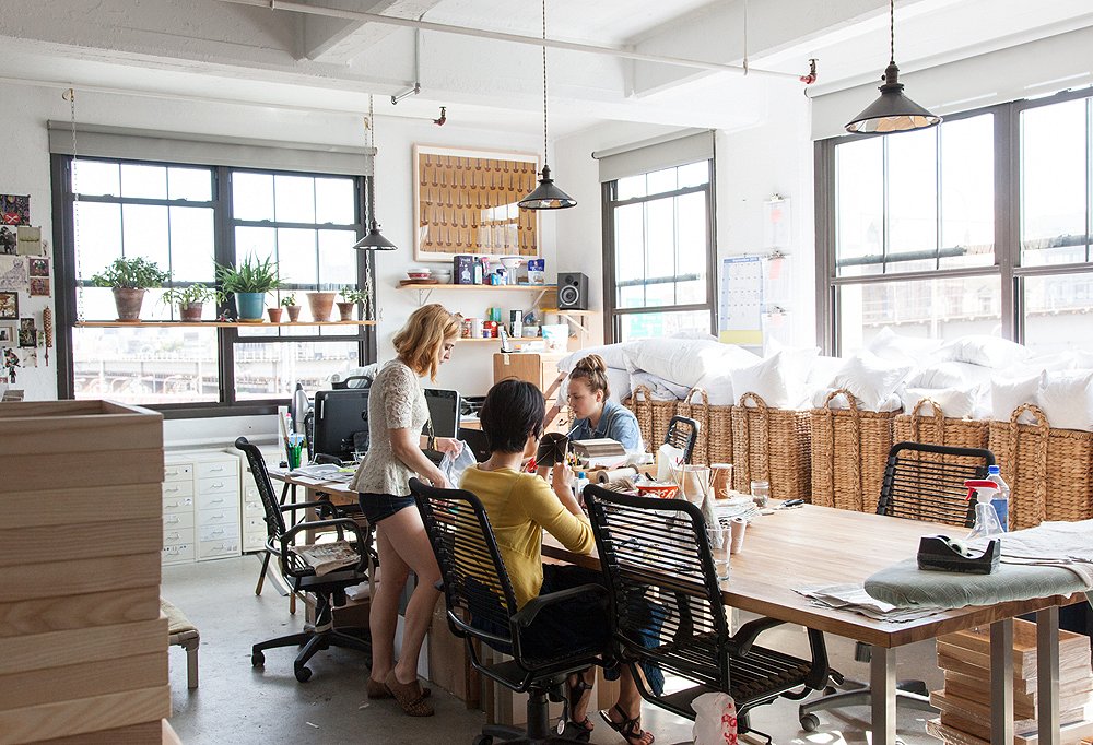 Three of Housley’s merry band of makers in action. “Right now we have four full-timers and three part-timers who are in for two to three days a week,” says Housley. “Everyone I work with is so focused and insanely talented.”
