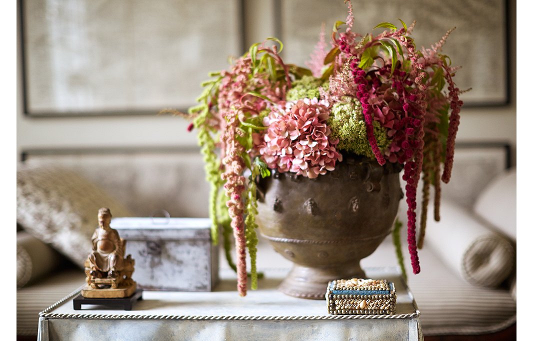 Fashion a perfectly undone arrangement with green and magenta amaranthuses, blush hydrangeas, and pink astilbes. Photo by Manuel Rodriguez; styled by Michelle Wong. 
