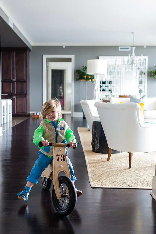 “He also has a basket of games and puzzles, and his bike and helmet sit in the corner with his car,” she says. “At his age, what more do you need?”
