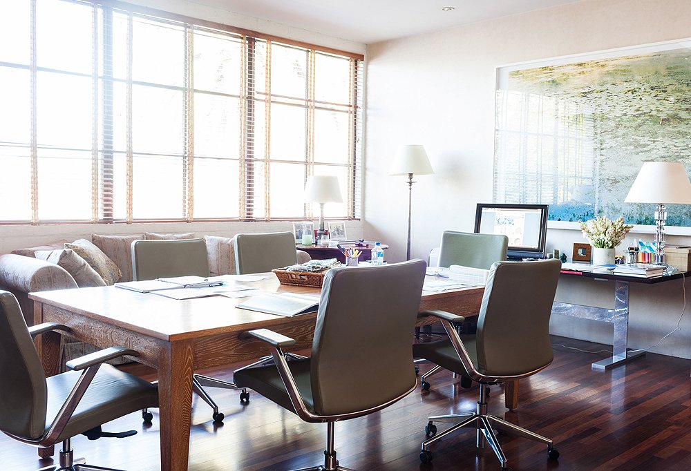 The main conference room doubles as Smith’s private office so that he can easily swivel around for meetings.
