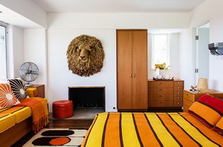 “We give the master suite to friends and family so that they can enjoy the great view… and the lion,” says Trina. (It’s one of three macramé animal heads by artist Judee du Bourdieu.) “We’re kind of obsessed.”
