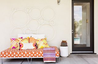 Trina’s favorite spot for an afternoon nap? This daybed covered in fabric from her textile collection with Schumacher. “It’s ideal because it’s always in the shade,” she says.
