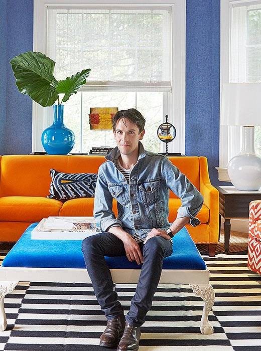 The color master himself, Patrick Mele, in the home’s colorful living room.
