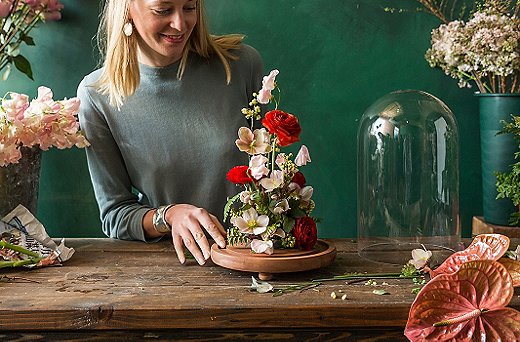 When you can’t fit anything else in the foam, you’re done. No need to rewet the foam. If the cloche gets fogged up, simply take it off the flowers for a few minutes.
