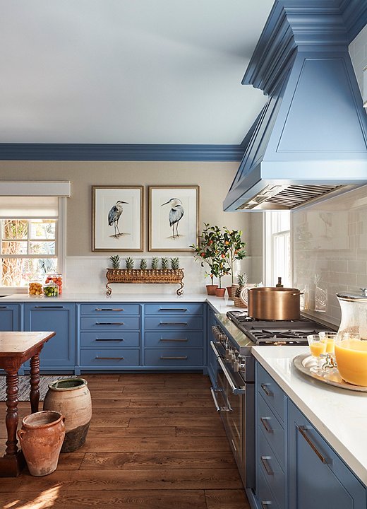 A blue-and-white palette works for every room of the house, including the kitchen. Design by Sarah Blank; photo by Carmel Brantley.
