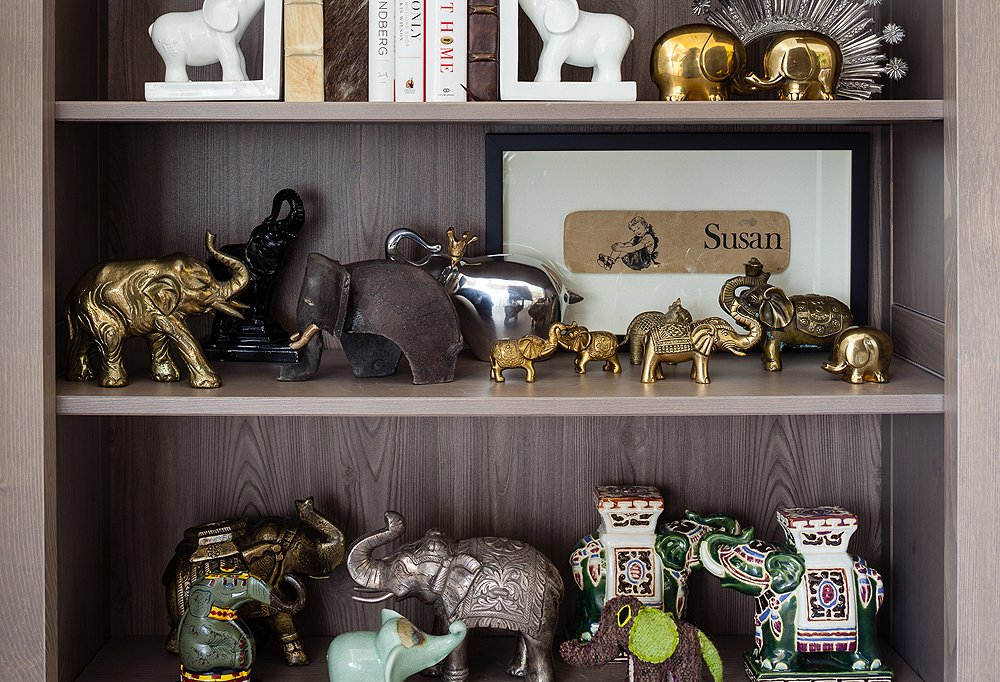 Susan’s impressive collection of elephants on display in her office bookcase.
