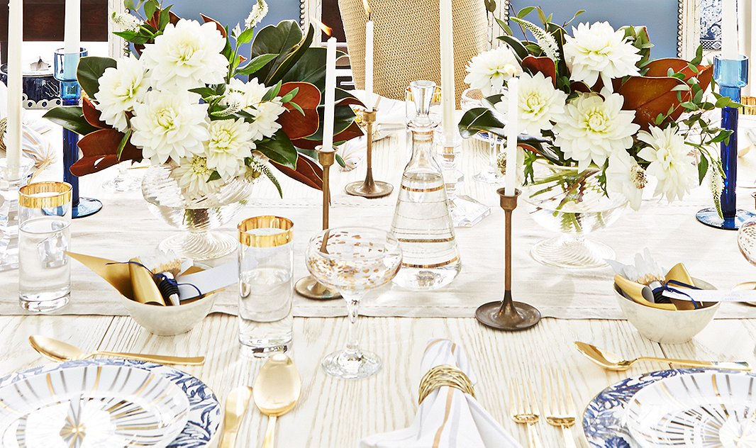 A mix of gold, glassware, and blue-and-white is the perfect choice for a fabulous Hanukkah table. Photo by Manuel Rodriguez. 
