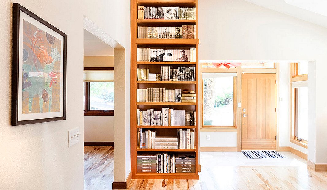 A towering shelf in Thatcher’s own home features dozens of sets from Juniper Books. 
