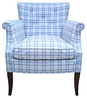 blue tufted armchair